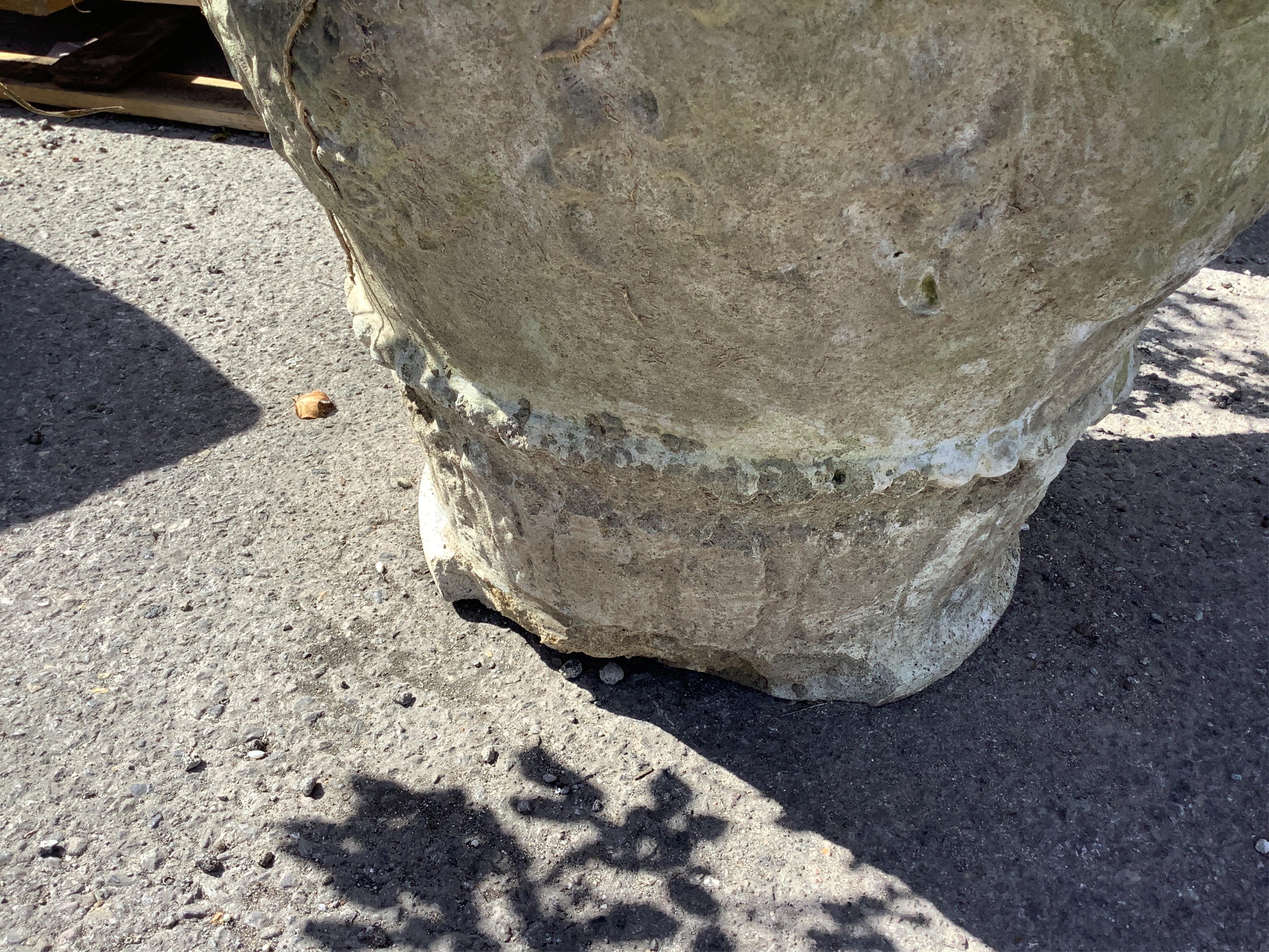 A pair of reconstituted stone garden planters, diameter 60cm, height 48cm